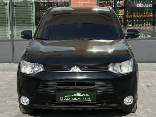 Мицубиси Аутлендер, объемом двигателя 2.4 л и пробегом 212 тыс. км за 11490 $, фото 4 на Automoto.ua