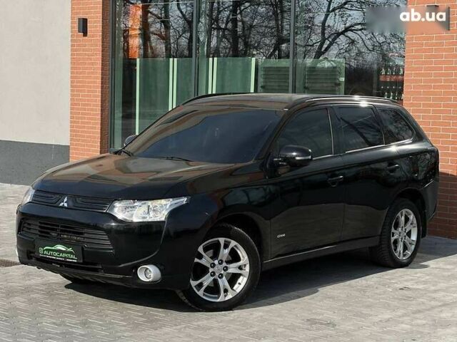 Мицубиси Аутлендер, объемом двигателя 2.4 л и пробегом 212 тыс. км за 11490 $, фото 1 на Automoto.ua