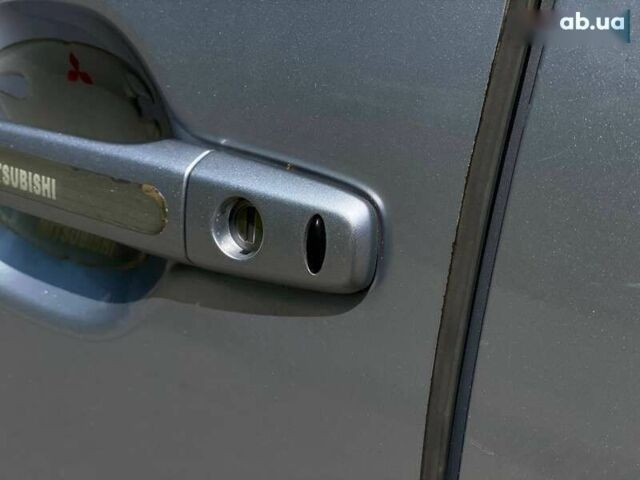 Мицубиси Аутлендер, объемом двигателя 2.3 л и пробегом 204 тыс. км за 15490 $, фото 11 на Automoto.ua
