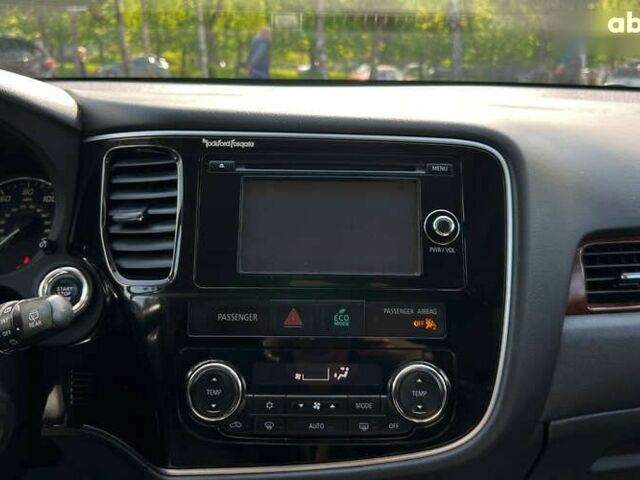 Мицубиси Аутлендер, объемом двигателя 2.4 л и пробегом 217 тыс. км за 13800 $, фото 12 на Automoto.ua