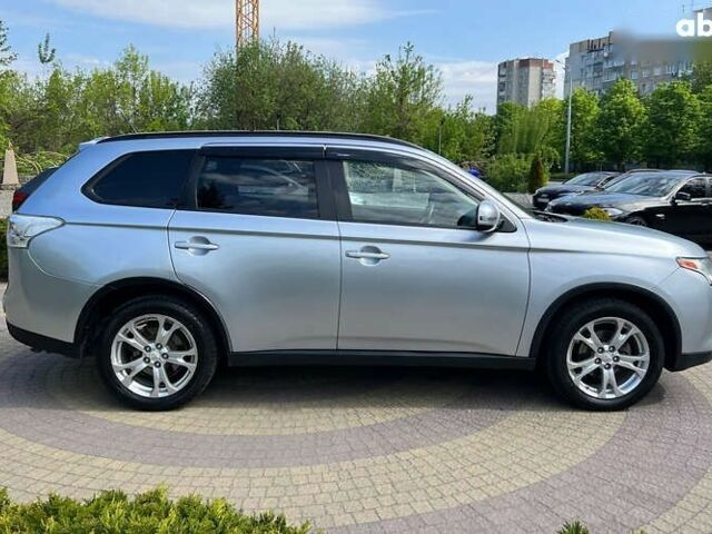 Мицубиси Аутлендер, объемом двигателя 2.4 л и пробегом 217 тыс. км за 13800 $, фото 7 на Automoto.ua