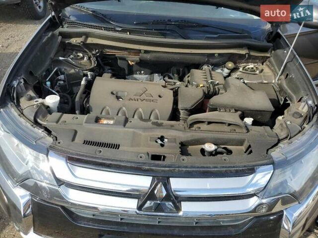 Мицубиси Аутлендер, объемом двигателя 2.4 л и пробегом 145 тыс. км за 2400 $, фото 10 на Automoto.ua