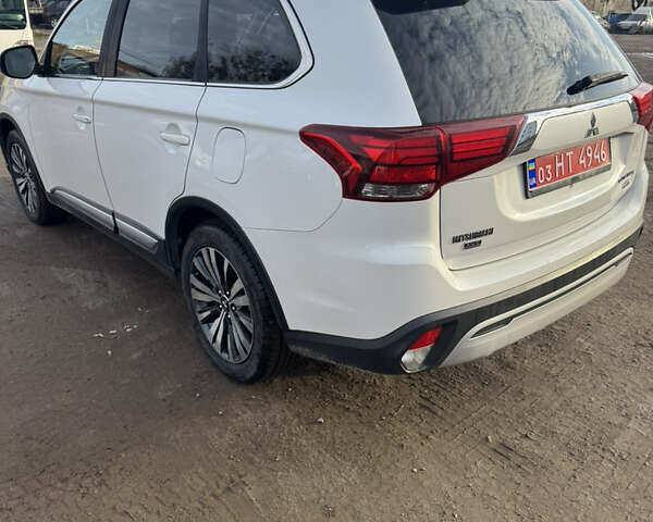 Мицубиси Аутлендер, объемом двигателя 0 л и пробегом 114 тыс. км за 14700 $, фото 6 на Automoto.ua