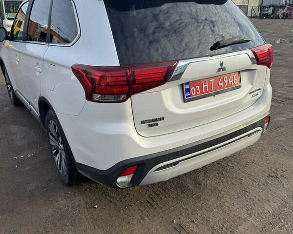 Мицубиси Аутлендер, объемом двигателя 0 л и пробегом 114 тыс. км за 14700 $, фото 5 на Automoto.ua