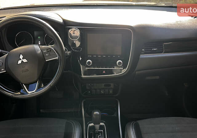 Мицубиси Аутлендер, объемом двигателя 2.36 л и пробегом 80 тыс. км за 17900 $, фото 6 на Automoto.ua
