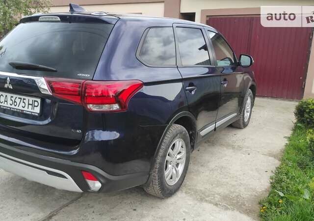 Мицубиси Аутлендер, объемом двигателя 2 л и пробегом 107 тыс. км за 18800 $, фото 4 на Automoto.ua