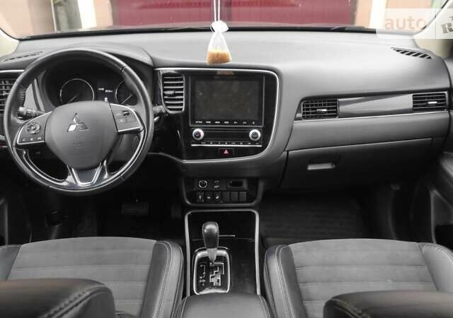 Мицубиси Аутлендер, объемом двигателя 2 л и пробегом 107 тыс. км за 18800 $, фото 11 на Automoto.ua