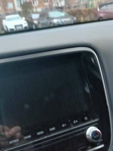 Мицубиси Аутлендер, объемом двигателя 2.4 л и пробегом 70 тыс. км за 21300 $, фото 4 на Automoto.ua