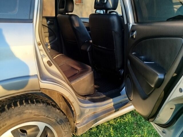 Серый Мицубиси Аутлендер, объемом двигателя 0 л и пробегом 245 тыс. км за 5300 $, фото 4 на Automoto.ua