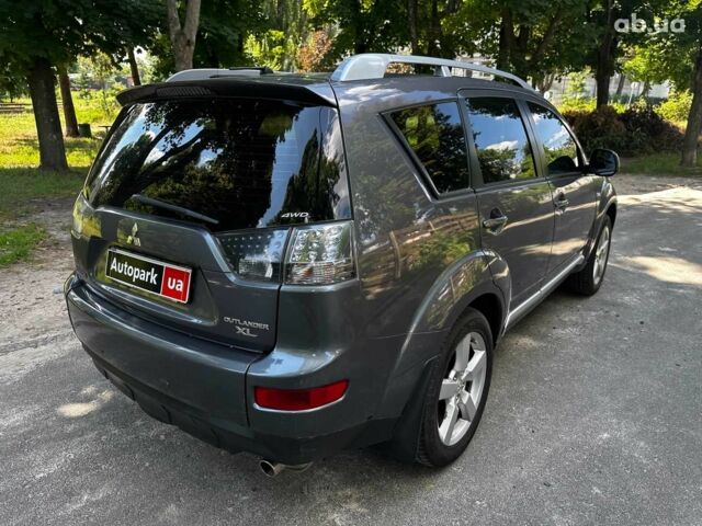 Серый Мицубиси Аутлендер, объемом двигателя 2.4 л и пробегом 130 тыс. км за 9790 $, фото 4 на Automoto.ua