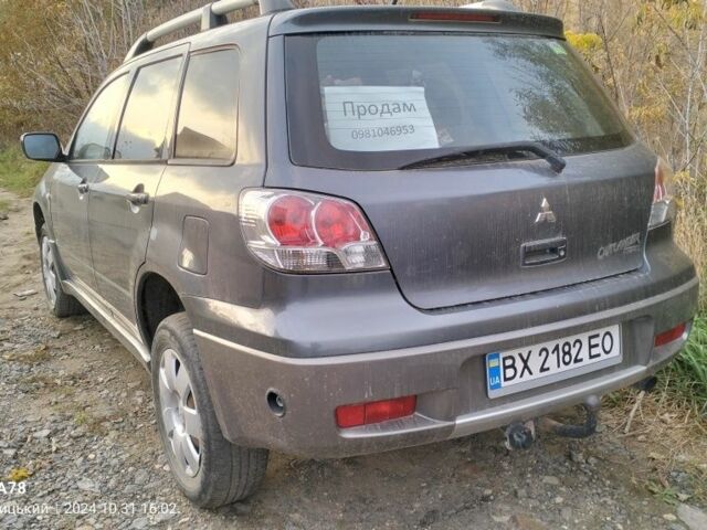 Сірий Міцубісі Аутлендер, об'ємом двигуна 2 л та пробігом 247 тис. км за 5500 $, фото 3 на Automoto.ua