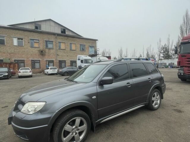 Сірий Міцубісі Аутлендер, об'ємом двигуна 2.4 л та пробігом 190 тис. км за 6500 $, фото 1 на Automoto.ua