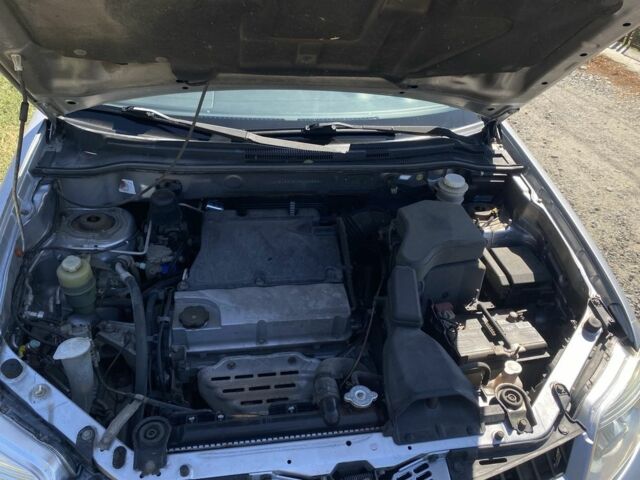 Серый Мицубиси Аутлендер, объемом двигателя 2.4 л и пробегом 291 тыс. км за 5999 $, фото 6 на Automoto.ua