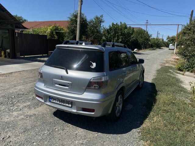 Серый Мицубиси Аутлендер, объемом двигателя 2.4 л и пробегом 291 тыс. км за 5999 $, фото 3 на Automoto.ua