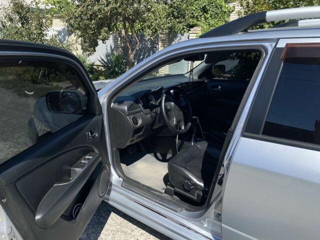 Серый Мицубиси Аутлендер, объемом двигателя 2.4 л и пробегом 291 тыс. км за 5999 $, фото 5 на Automoto.ua