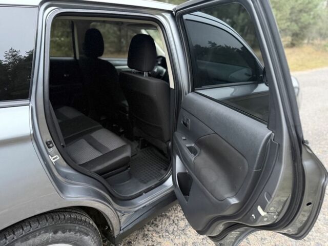 Серый Мицубиси Аутлендер, объемом двигателя 2.4 л и пробегом 150 тыс. км за 10900 $, фото 7 на Automoto.ua