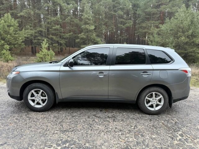 Серый Мицубиси Аутлендер, объемом двигателя 2.4 л и пробегом 150 тыс. км за 10900 $, фото 3 на Automoto.ua