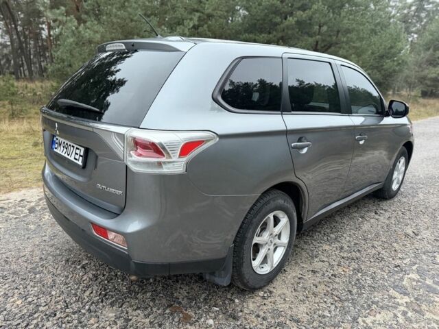 Серый Мицубиси Аутлендер, объемом двигателя 2.4 л и пробегом 150 тыс. км за 10900 $, фото 2 на Automoto.ua