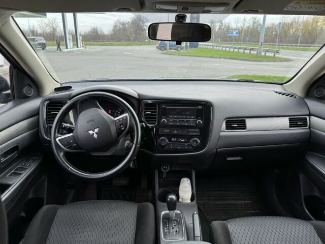 Серый Мицубиси Аутлендер, объемом двигателя 2 л и пробегом 177 тыс. км за 10399 $, фото 10 на Automoto.ua