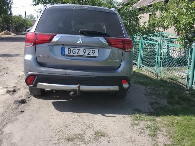Сірий Міцубісі Аутлендер, об'ємом двигуна 2.3 л та пробігом 195 тис. км за 11000 $, фото 1 на Automoto.ua