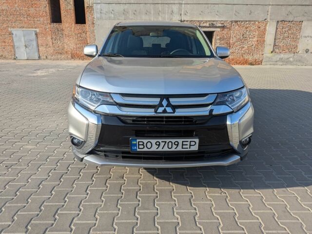 Серый Мицубиси Аутлендер, объемом двигателя 2.4 л и пробегом 142 тыс. км за 15999 $, фото 1 на Automoto.ua