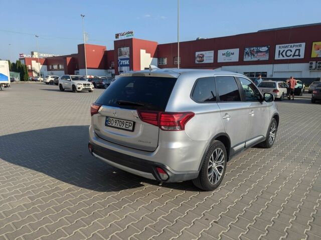 Серый Мицубиси Аутлендер, объемом двигателя 2.4 л и пробегом 142 тыс. км за 15999 $, фото 4 на Automoto.ua