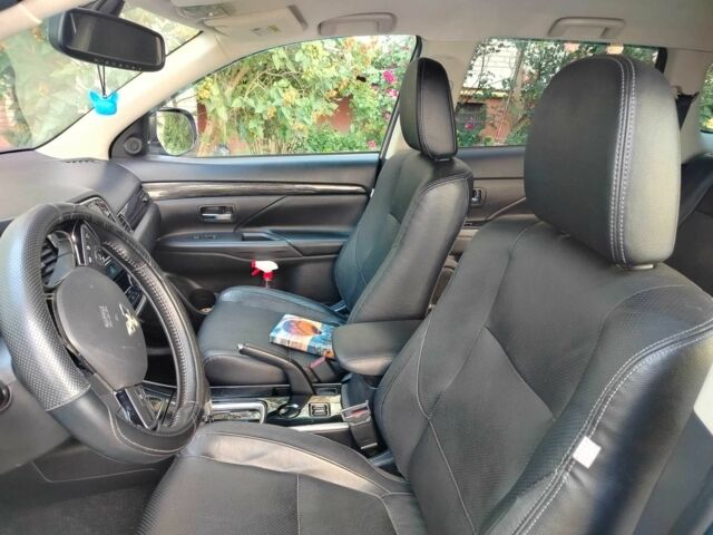 Сірий Міцубісі Аутлендер, об'ємом двигуна 2.4 л та пробігом 95 тис. км за 16800 $, фото 11 на Automoto.ua