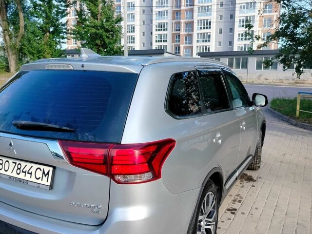 Сірий Міцубісі Аутлендер, об'ємом двигуна 2.4 л та пробігом 95 тис. км за 16800 $, фото 4 на Automoto.ua