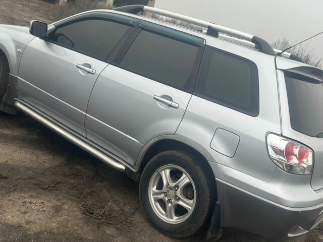 Сірий Міцубісі Аутлендер, об'ємом двигуна 2.4 л та пробігом 275 тис. км за 6400 $, фото 2 на Automoto.ua