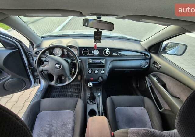 Серый Мицубиси Аутлендер, объемом двигателя 2 л и пробегом 209 тыс. км за 5800 $, фото 7 на Automoto.ua