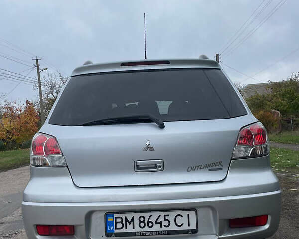 Сірий Міцубісі Аутлендер, об'ємом двигуна 2 л та пробігом 252 тис. км за 4600 $, фото 11 на Automoto.ua