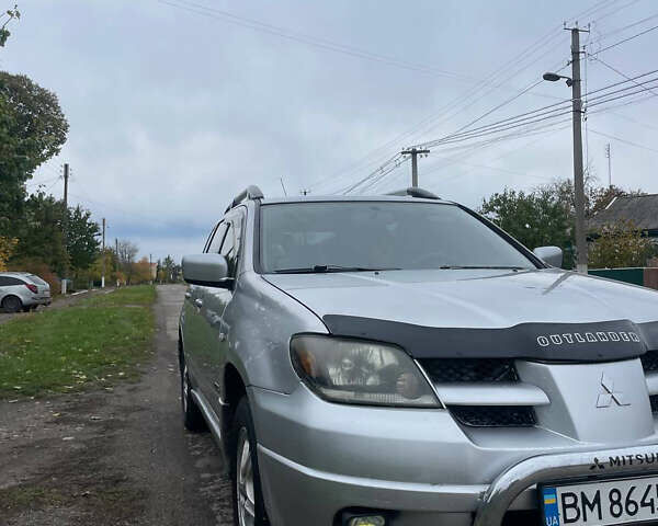 Сірий Міцубісі Аутлендер, об'ємом двигуна 2 л та пробігом 252 тис. км за 4600 $, фото 13 на Automoto.ua