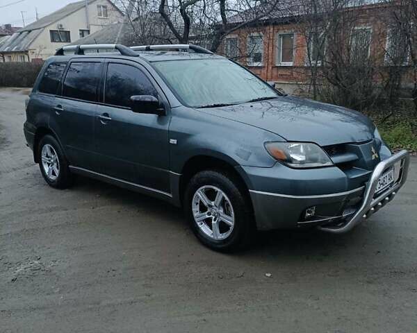 Сірий Міцубісі Аутлендер, об'ємом двигуна 2 л та пробігом 160 тис. км за 4800 $, фото 1 на Automoto.ua
