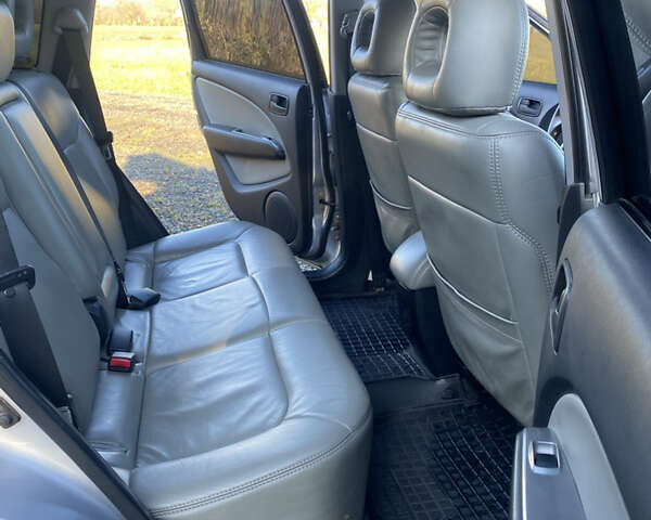 Серый Мицубиси Аутлендер, объемом двигателя 2 л и пробегом 250 тыс. км за 5700 $, фото 12 на Automoto.ua