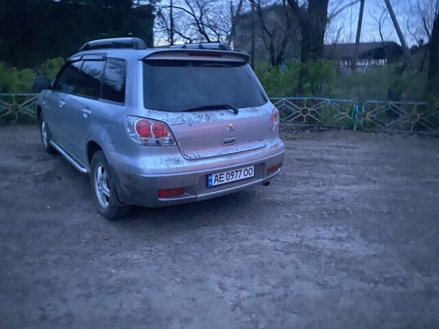 Сірий Міцубісі Аутлендер, об'ємом двигуна 2.4 л та пробігом 275 тис. км за 6400 $, фото 11 на Automoto.ua