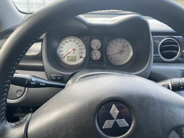 Сірий Міцубісі Аутлендер, об'ємом двигуна 2 л та пробігом 228 тис. км за 6300 $, фото 7 на Automoto.ua