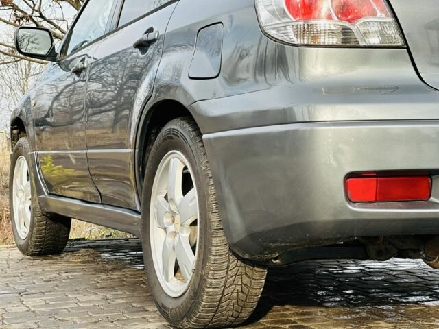 Сірий Міцубісі Аутлендер, об'ємом двигуна 2 л та пробігом 280 тис. км за 3500 $, фото 6 на Automoto.ua