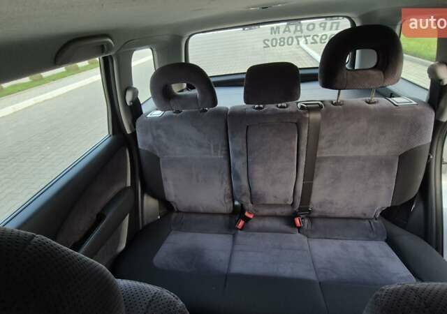 Серый Мицубиси Аутлендер, объемом двигателя 2 л и пробегом 209 тыс. км за 5800 $, фото 6 на Automoto.ua