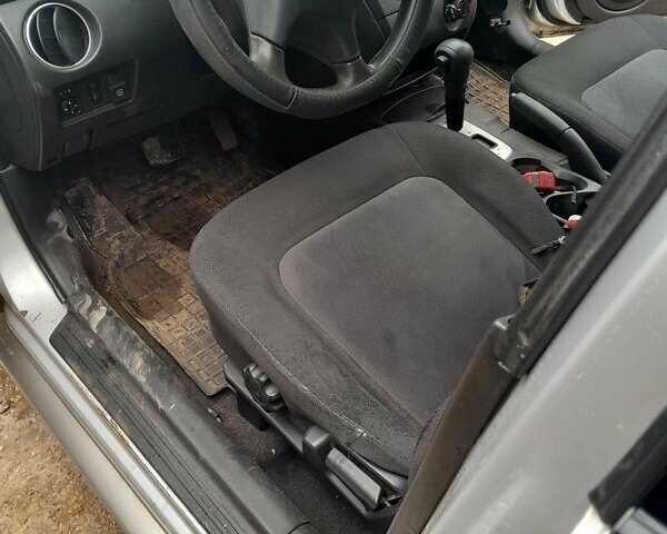 Серый Мицубиси Аутлендер, объемом двигателя 2.4 л и пробегом 250 тыс. км за 5600 $, фото 5 на Automoto.ua