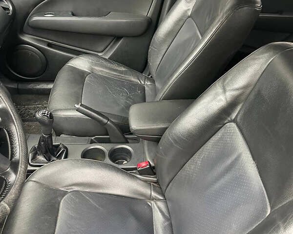 Сірий Міцубісі Аутлендер, об'ємом двигуна 2 л та пробігом 252 тис. км за 4600 $, фото 21 на Automoto.ua