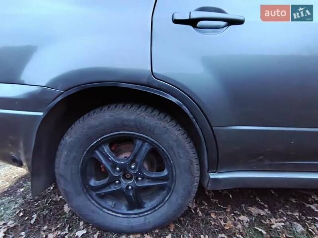 Мицубиси Аутлендер 2003 в Миргороде на Automoto.ua Серый Мицубиси Аутлендер, объемом двигателя 2 л и пробегом 354 тыс. км за 5000 $, фото 12 на Automoto.ua