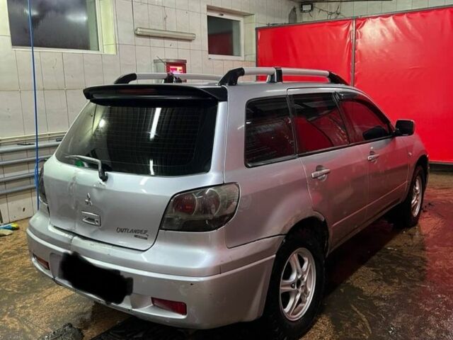 Серый Мицубиси Аутлендер, объемом двигателя 0 л и пробегом 400 тыс. км за 2500 $, фото 2 на Automoto.ua