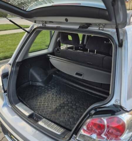 Серый Мицубиси Аутлендер, объемом двигателя 2 л и пробегом 209 тыс. км за 5800 $, фото 5 на Automoto.ua