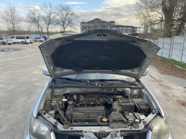 Сірий Міцубісі Аутлендер, об'ємом двигуна 2 л та пробігом 228 тис. км за 6300 $, фото 8 на Automoto.ua