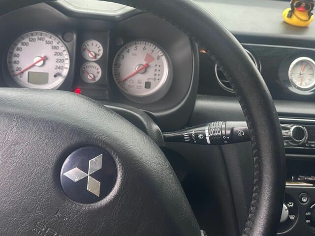 Сірий Міцубісі Аутлендер, об'ємом двигуна 2.4 л та пробігом 275 тис. км за 6400 $, фото 7 на Automoto.ua