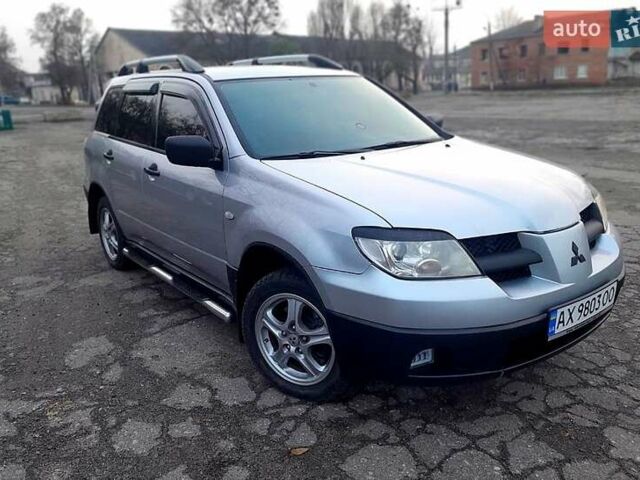 Серый Мицубиси Аутлендер, объемом двигателя 2 л и пробегом 400 тыс. км за 5000 $, фото 11 на Automoto.ua