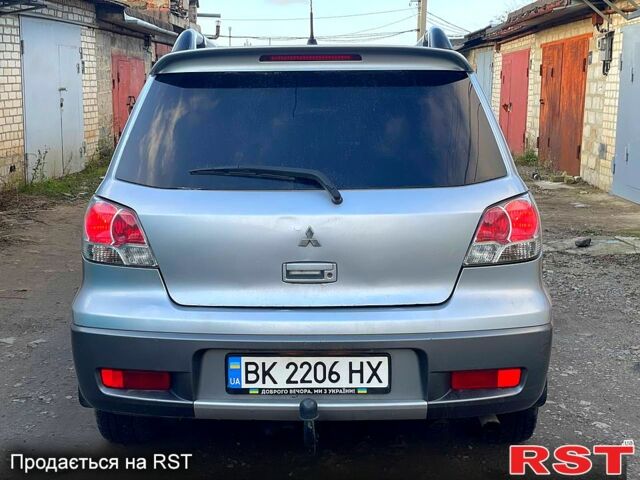 Сірий Міцубісі Аутлендер, об'ємом двигуна 2 л та пробігом 333 тис. км за 4850 $, фото 1 на Automoto.ua