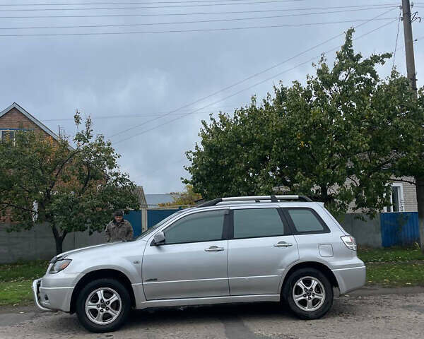 Сірий Міцубісі Аутлендер, об'ємом двигуна 2 л та пробігом 252 тис. км за 4600 $, фото 8 на Automoto.ua