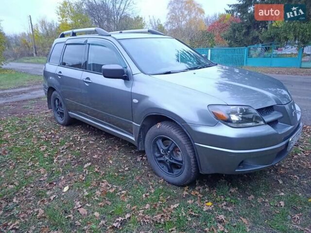 Мицубиси Аутлендер 2003 в Миргороде на Automoto.ua Серый Мицубиси Аутлендер, объемом двигателя 2 л и пробегом 354 тыс. км за 5000 $, фото 2 на Automoto.ua