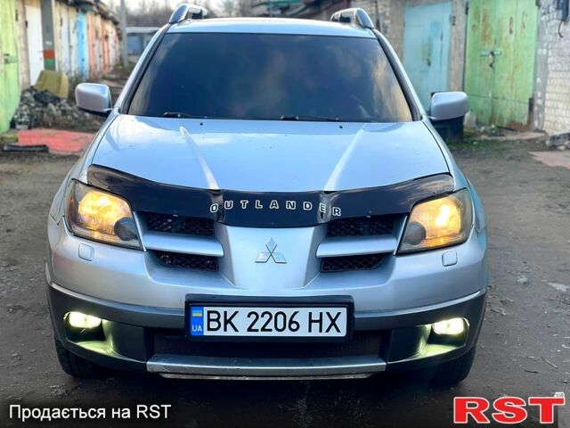 Сірий Міцубісі Аутлендер, об'ємом двигуна 2 л та пробігом 333 тис. км за 4850 $, фото 2 на Automoto.ua
